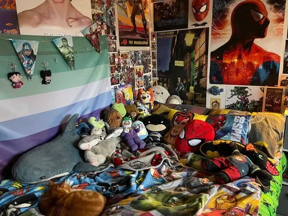 A bed covered in lots of stuffed animals and pictures.