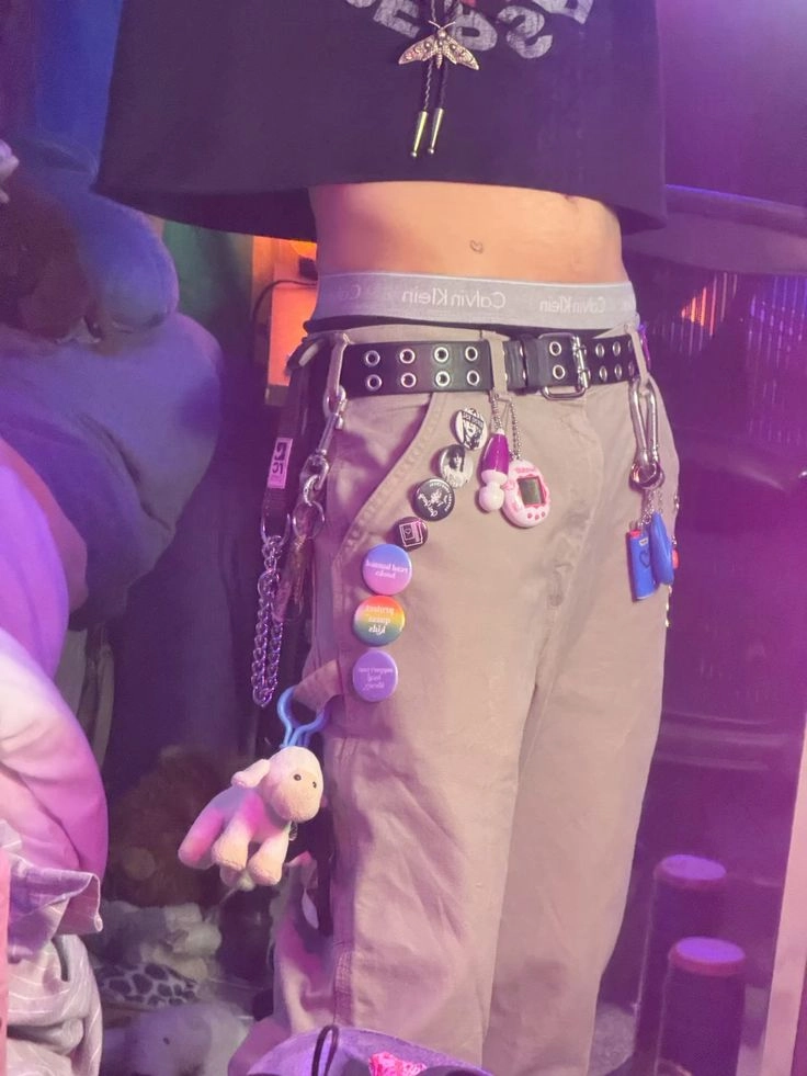 A mannequin wearing a black hat and a pair of pants.