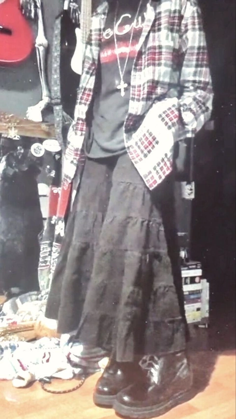 A collage of a woman wearing a plaid shirt and skirt.