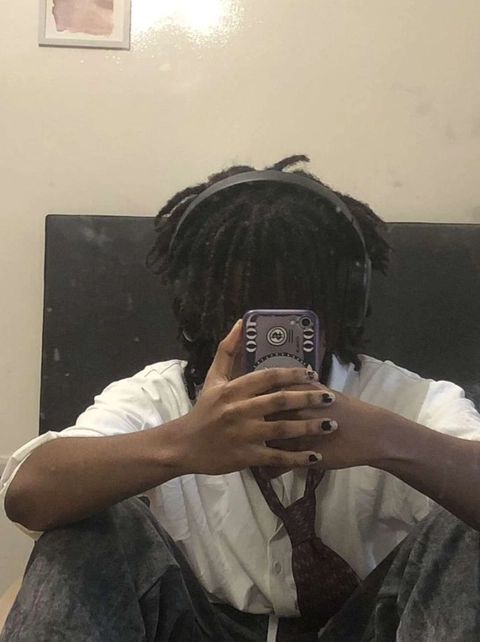 A woman taking a picture of herself in a mirror.