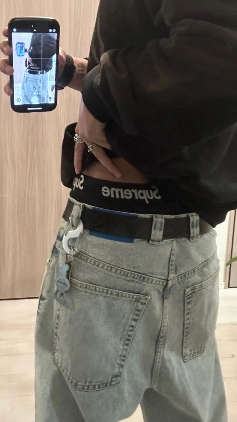 A person taking a picture of themselves in a mirror.
