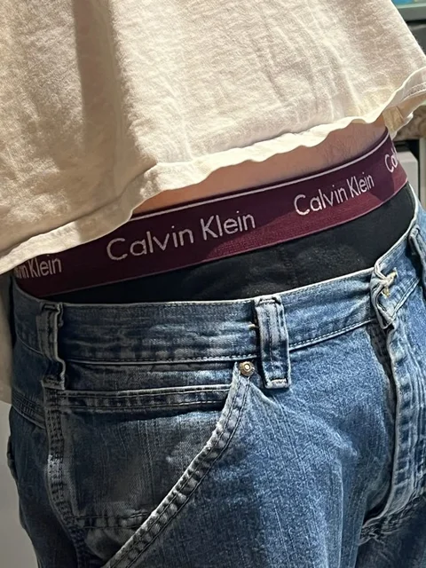 A pair of jeans with the words Calvin Klein on them.