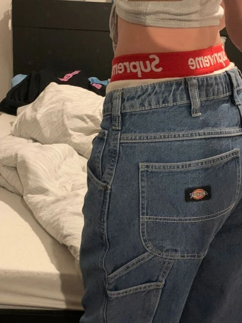 A pair of jeans with the word "dickies" written on them.