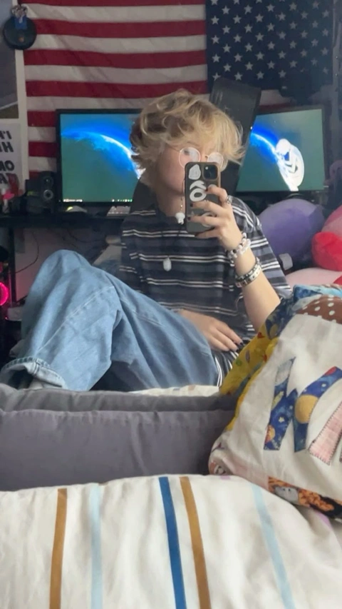 A woman taking a picture of herself in a mirror.